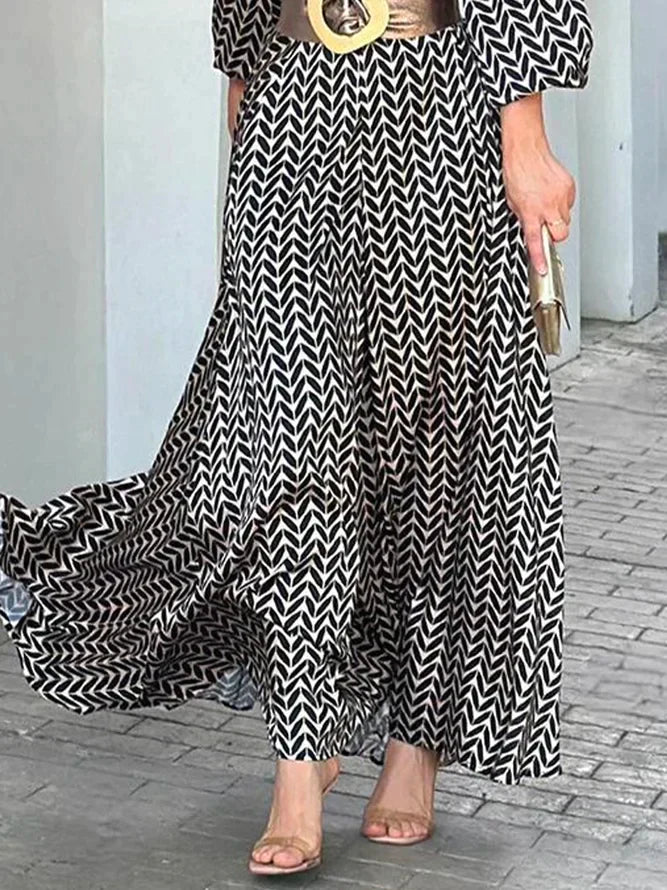 Zoe Chic - Elegantes, ausgestelltes Kleid mit V-Ausschnitt und Puffärmel